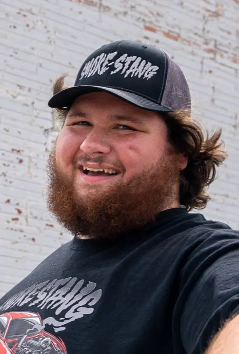 Westen Champlin headshot Westen Champlin smiling in a selfie